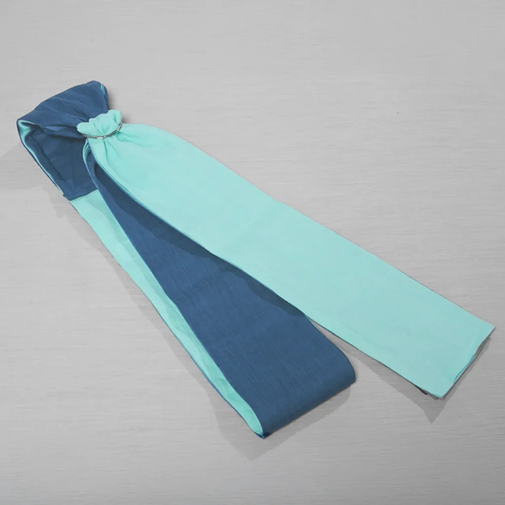 PsLing as delivered, folded with the fabric temporarily threaded through the rings