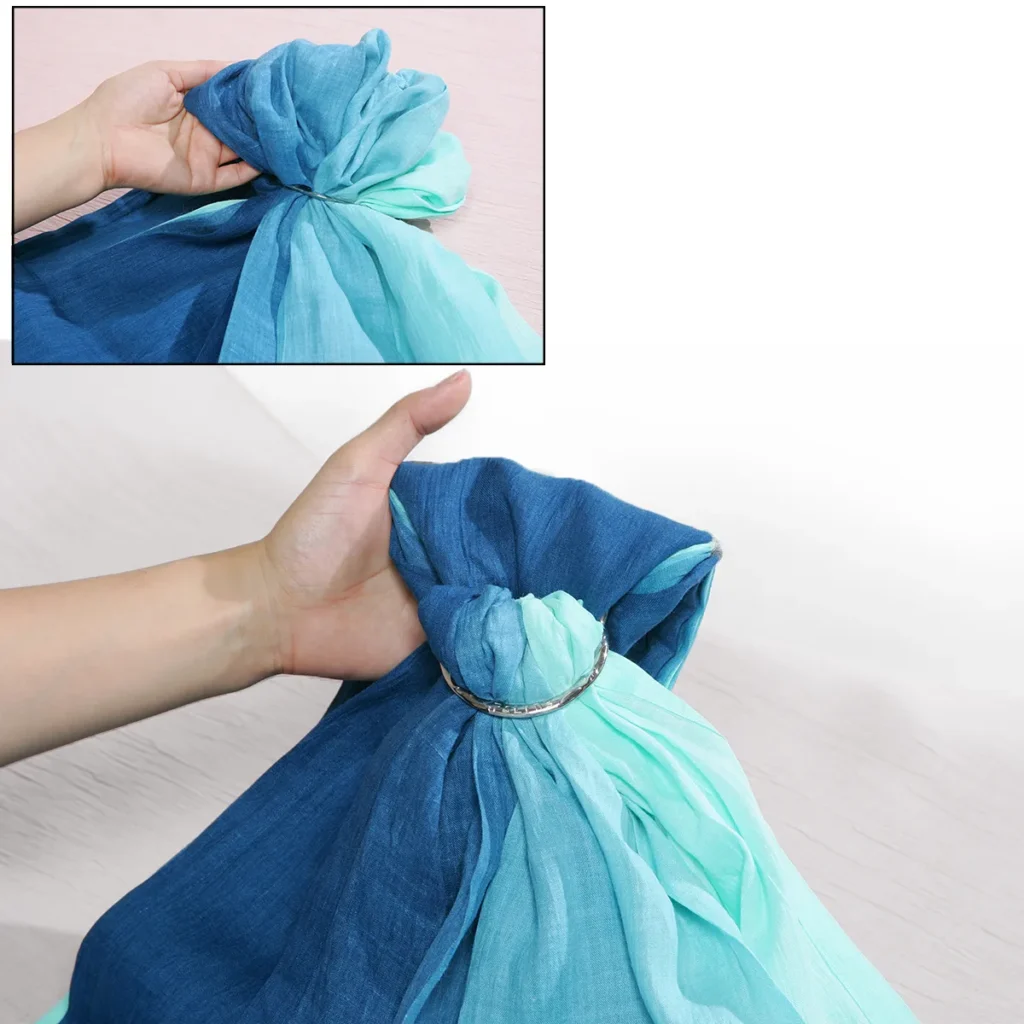 Pull the tail gently down while keeping the ring gathers evenly arranged